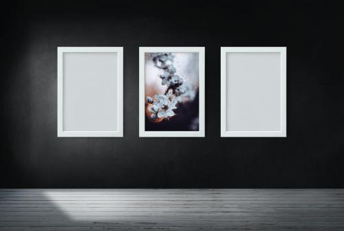 Frame mockup against a black wall - 586123