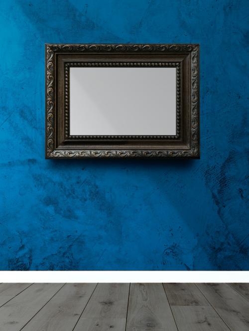 Baroque frame mockup on a blue wall - 586148