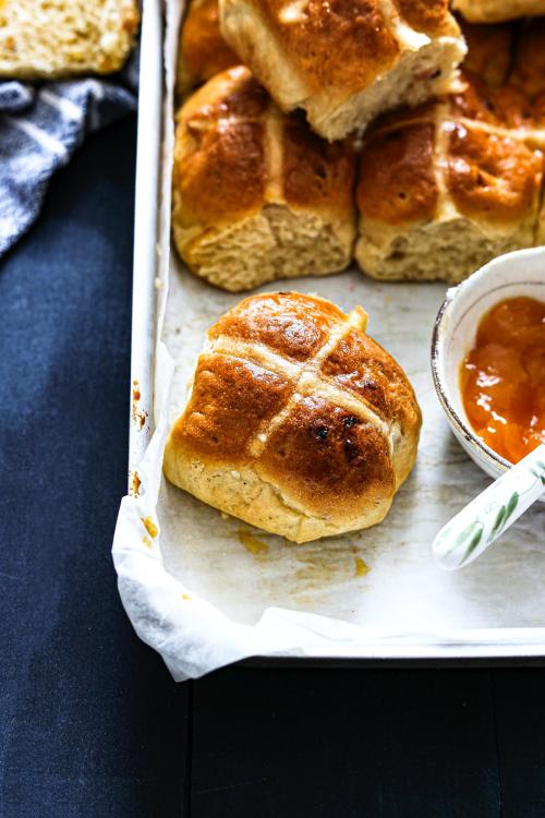 Freshly baked hot cross buns with apricot jam - 2225741