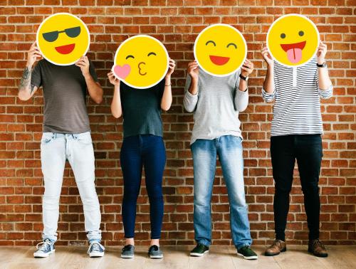 People holding positive emoticons - 537751