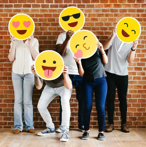 People holding positive emoticons - 537755