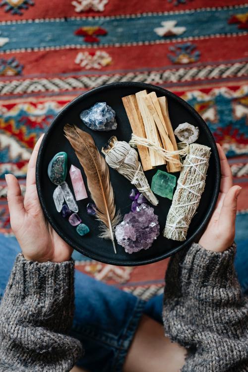 Woman with sage and crystals ready for smudging - 2285558