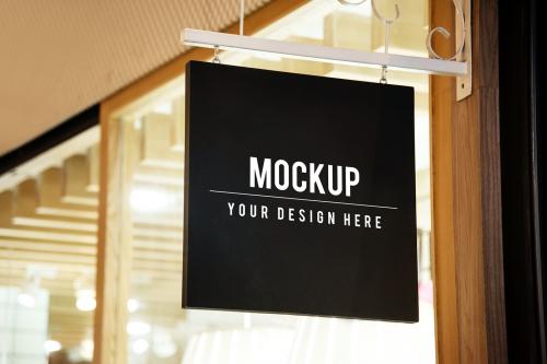 Mockup sign outside of a shop - 545217