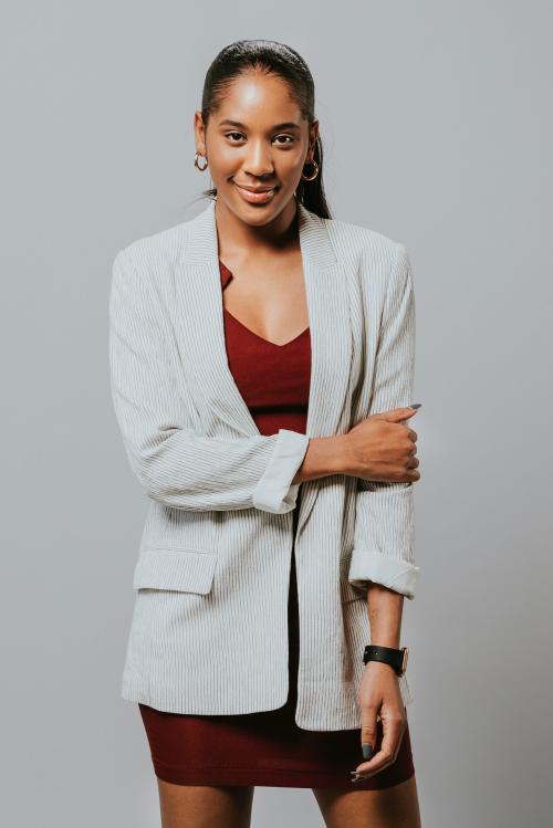 Happy businesswoman in a blazer - 2020096