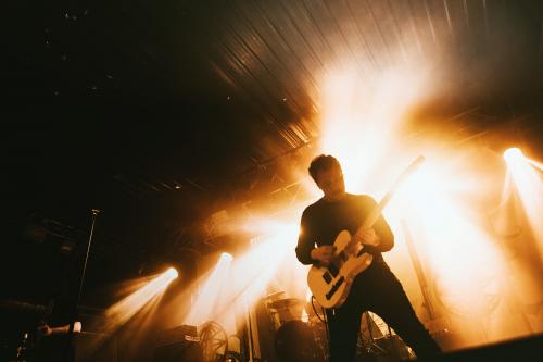 Guitarist playing electric guitar in a rock concert - 2271118