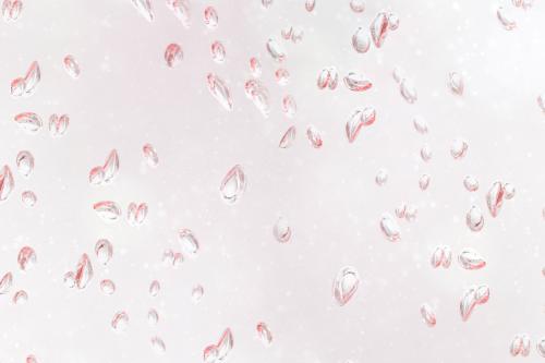 Light pink droplets on a window background - 2272778