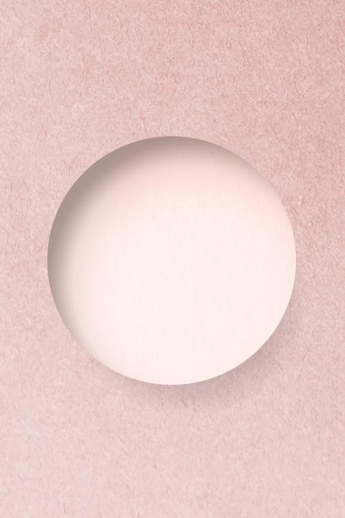 Round shape on a pink concrete textured background vector - 1222462