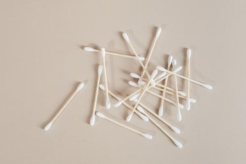 Natural cotton buds isolated on beige background - 2255799