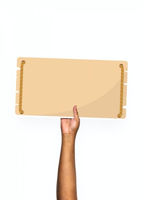 Hand holding a blank signage cardboard prop - 526118