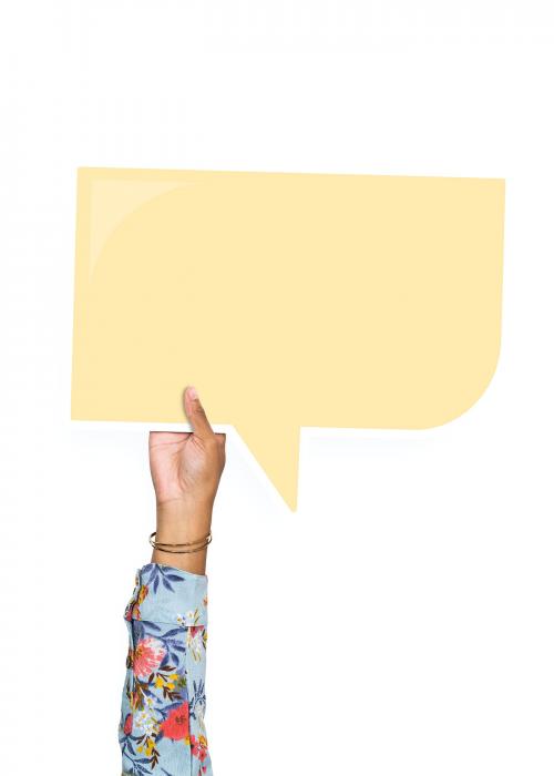 Hand holding a speech bubble cardboard prop - 526327