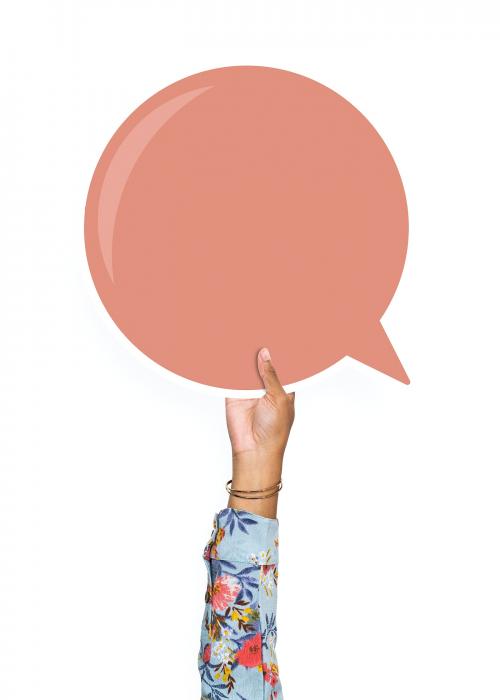 Hand holding a speech bubble cardboard prop - 526349