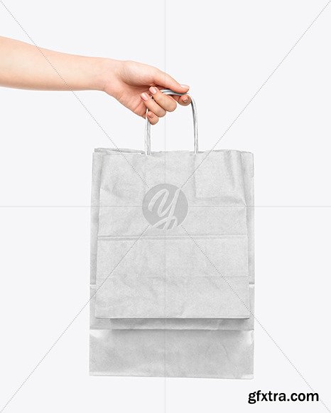 Hand w/ Two Paper Bags Mockup 59341