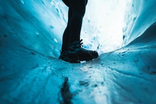 Female explorer in the ice cave, Iceland - 2042731