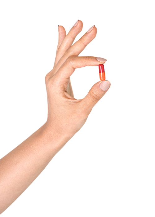 Hand holding a colorful pill transparent png - 2052996