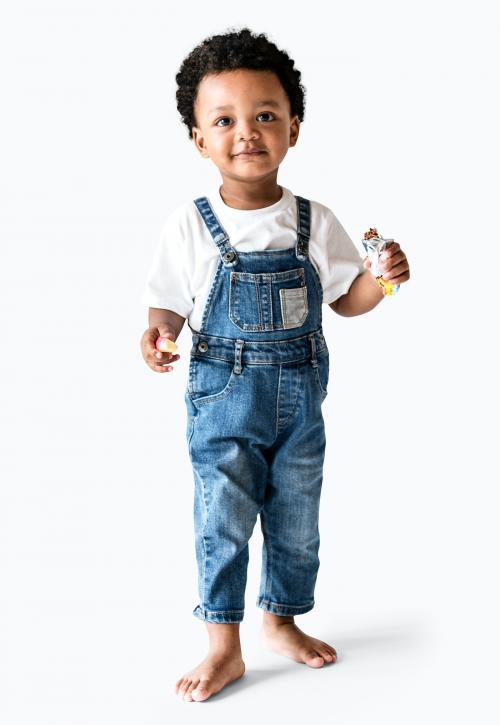 Happy young boy holding a protein bar - 536047