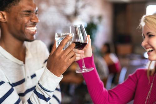 Friends making a toast at a dinner party - 2205512