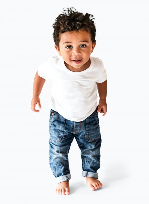 Happy young boy in a studio - 536121