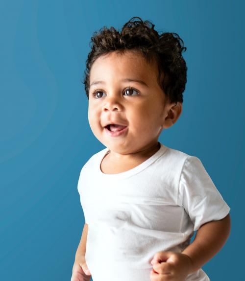 Happy young boy in a studio - 536128