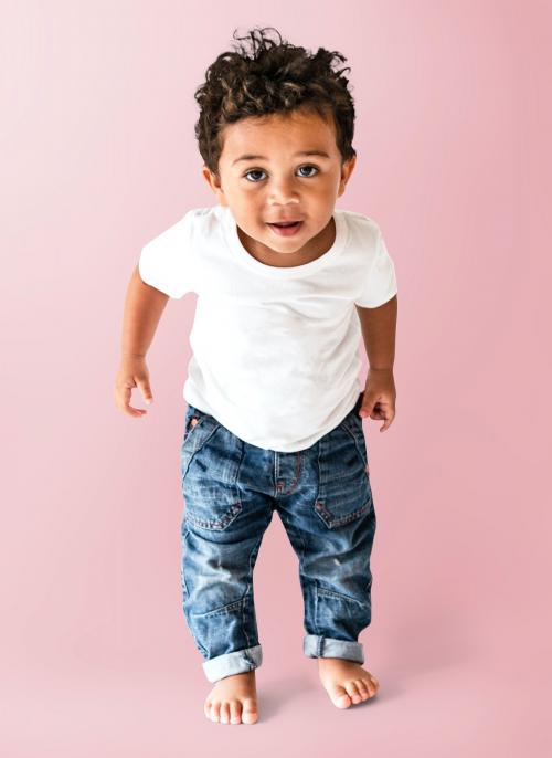 Happy young boy in a studio - 536129