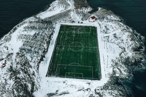 Drone view of Henningsvaer football Stadium - 2255761