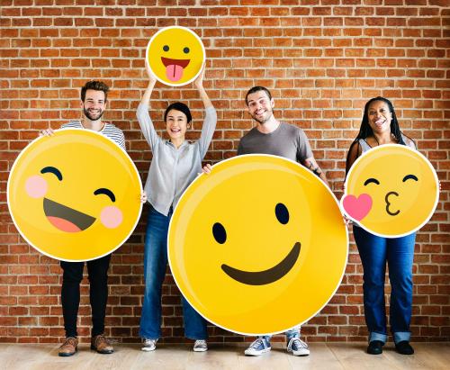 Diverse people holding positive emoticons - 537726