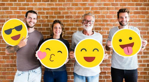 Happy people holding positive emoticons - 537782