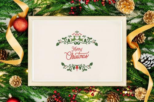 Merry Christmas greeting in a frame mockup - 520110