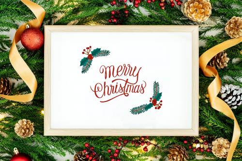 Merry Christmas greeting in a frame mockup - 520111