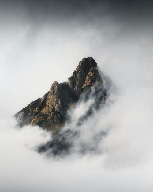 Julian Alps peak covered in heavy fog - 2047708