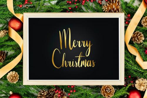 Merry Christmas greeting in a frame mockup - 520125