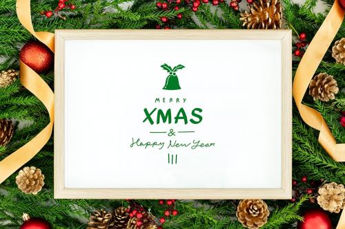 Merry Christmas greeting in a frame mockup - 520140