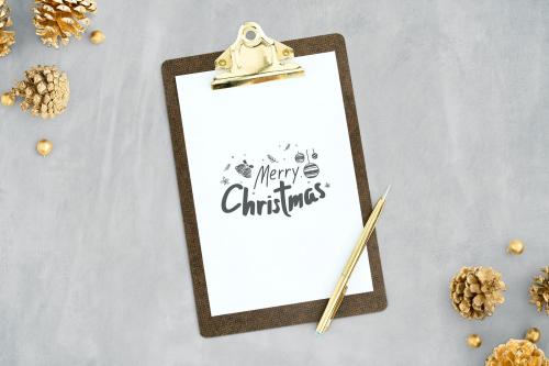 Merry Christmas drawn on a clipboard mockup - 520163