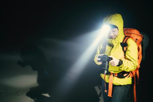 Mountaineer trekking in the cold night at Glen Coe, Scotland - 2221635