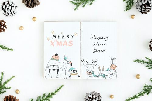 Christmas illustrations in a notebook mockup - 520174
