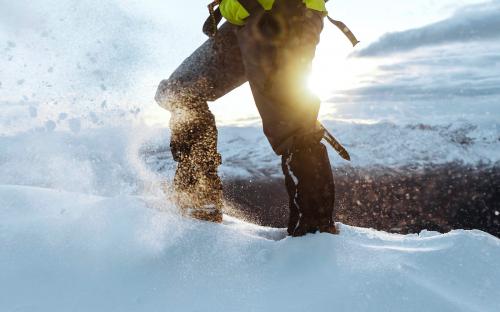 Mountaineer climbing in the snow at Liathach Ridge, Scotland - 2221584