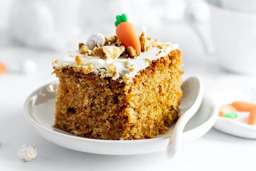 Slice of fresh homemade carrot cake - 2269712