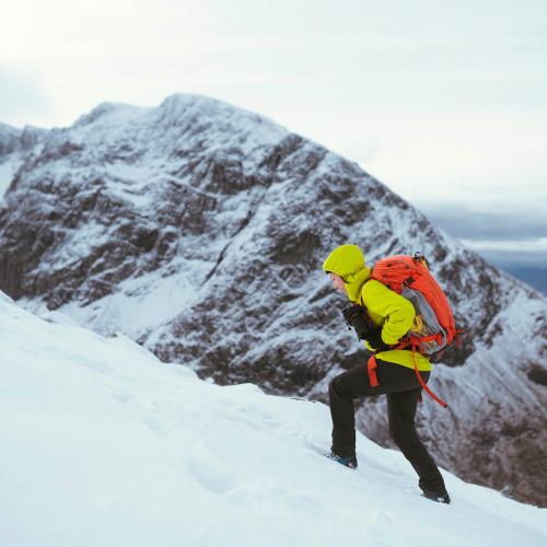 Hiker at a snowy Ben Nevis in winter - 2098254