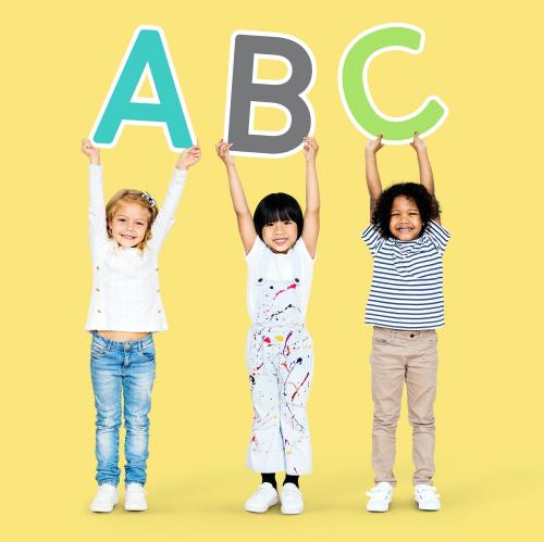 Diverse happy kids holding the ABC - 504087