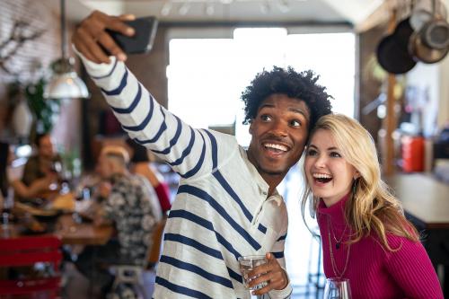 Friends taking a selfie at a party - 2205513