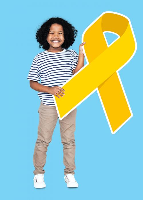 Young boy holding a golden ribbon supporting childhood cancer awareness - 504145