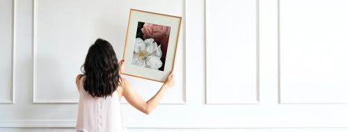 Curator hanging floral art frame on the wall social banner - 2024853