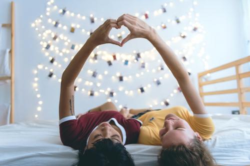 Girls making a heart shape with their hands - 2024874