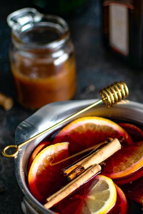 Festive holiday mulled wine in a pot - 2037851