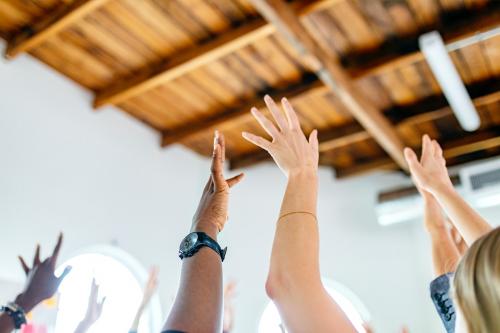 Team making hands raised in the air - 2204209