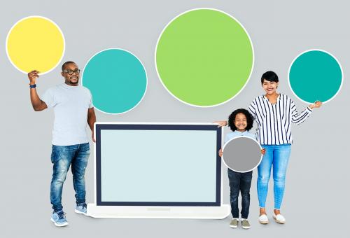 Happy family with a blank laptop screen - 503936