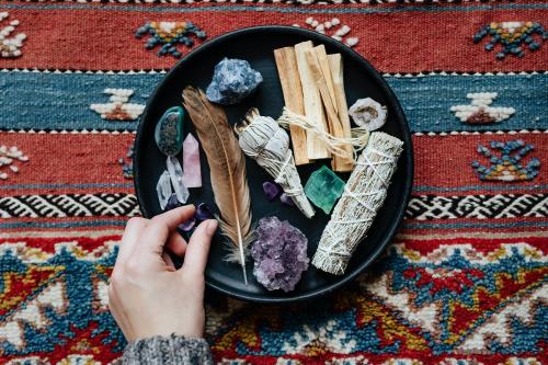 Woman with sage and crystals ready for smudging - 2282005