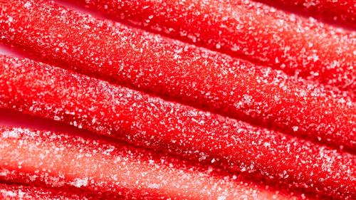 Red chewy candies coated with sugar - 2296616