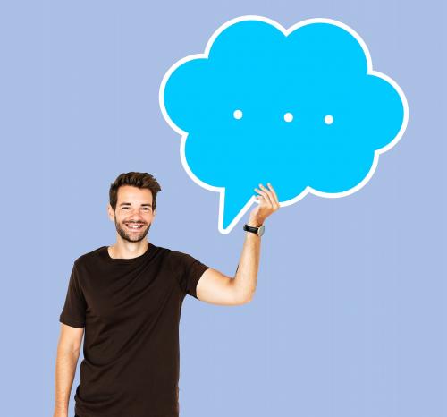 Happy man holding a speech bubble - 493373