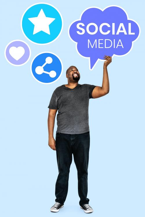 Man holding social media symbols - 493388