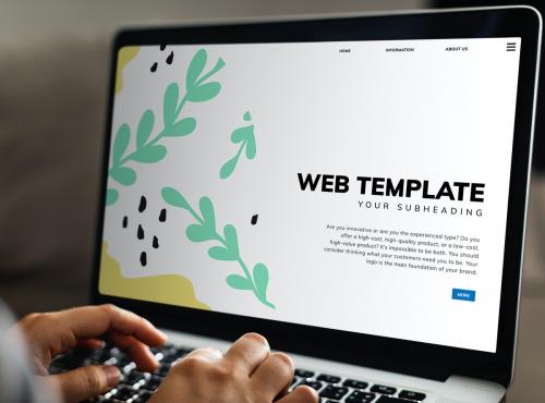 Working on a web template on the laptop - 502696